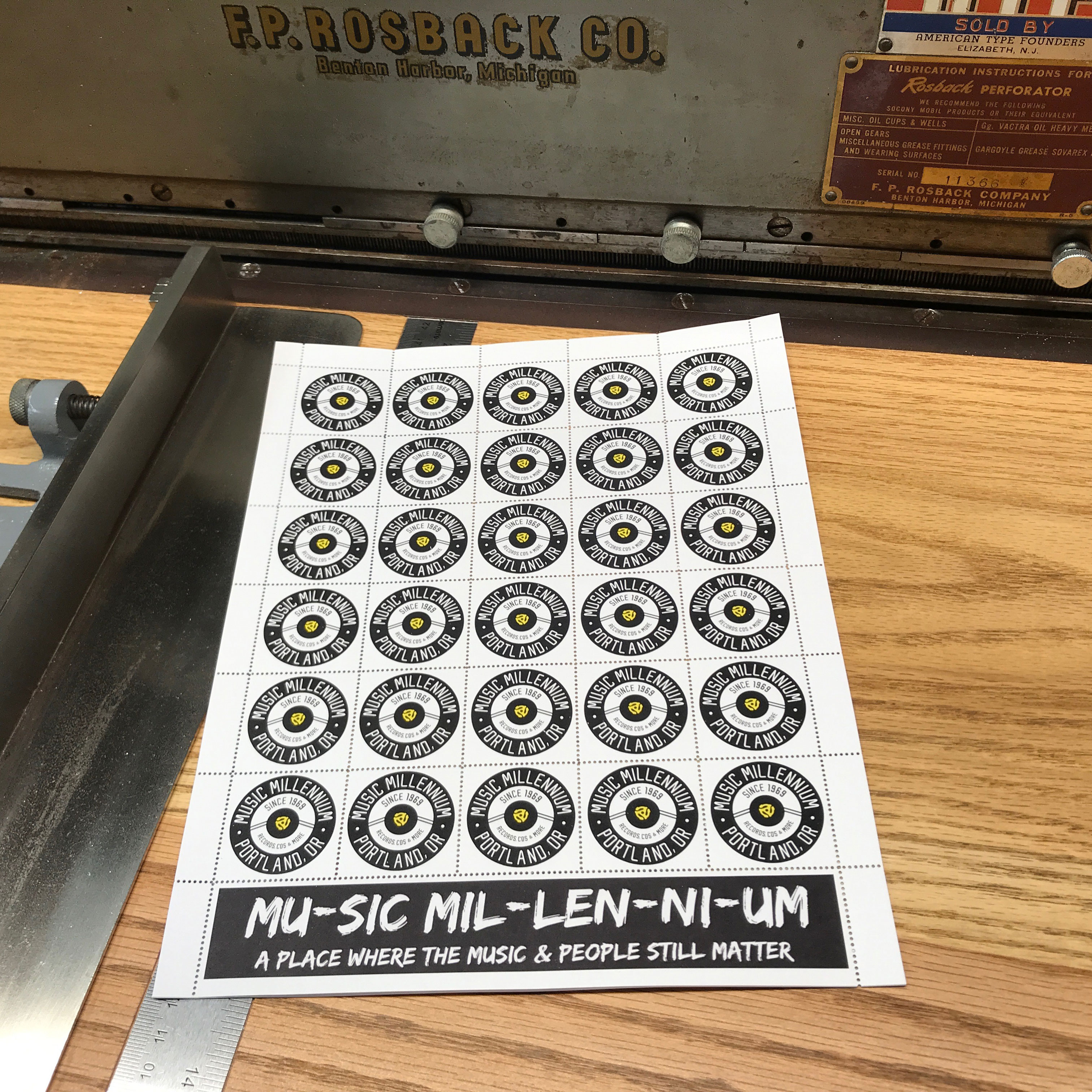 music millennium stamp sheet on the perforator
