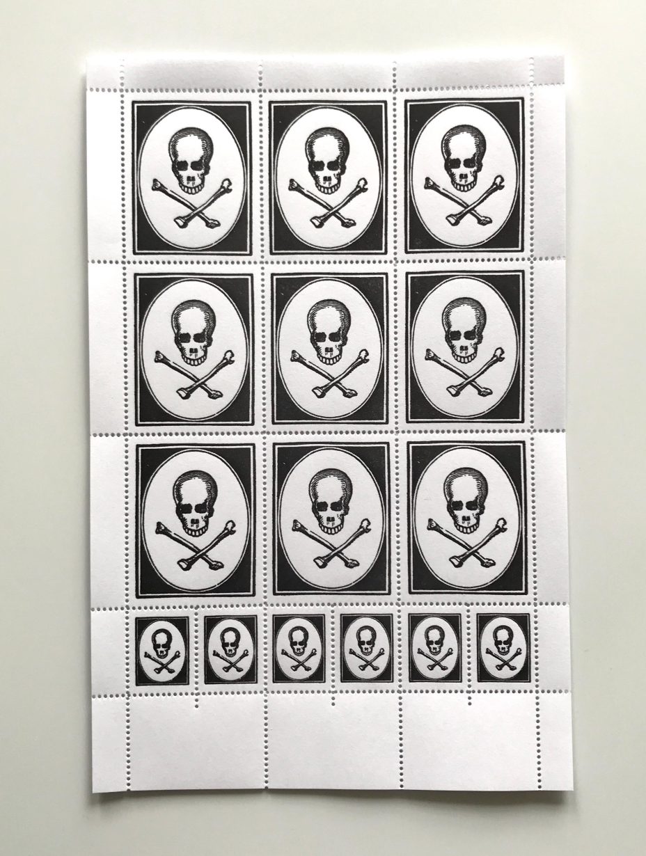 post crypt skull crossbones stamps